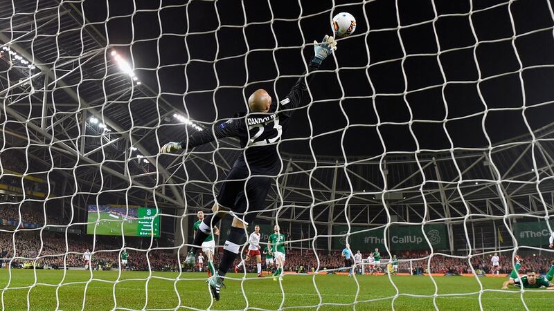 Christian Eriksen scores Denmark’s second goal past Ireland goalkeeper Darren Randolph during the 2018 World Cup qualifier playoff second leg at the Aviva Stadium. Photograph: Mike Hewitt/Getty Images