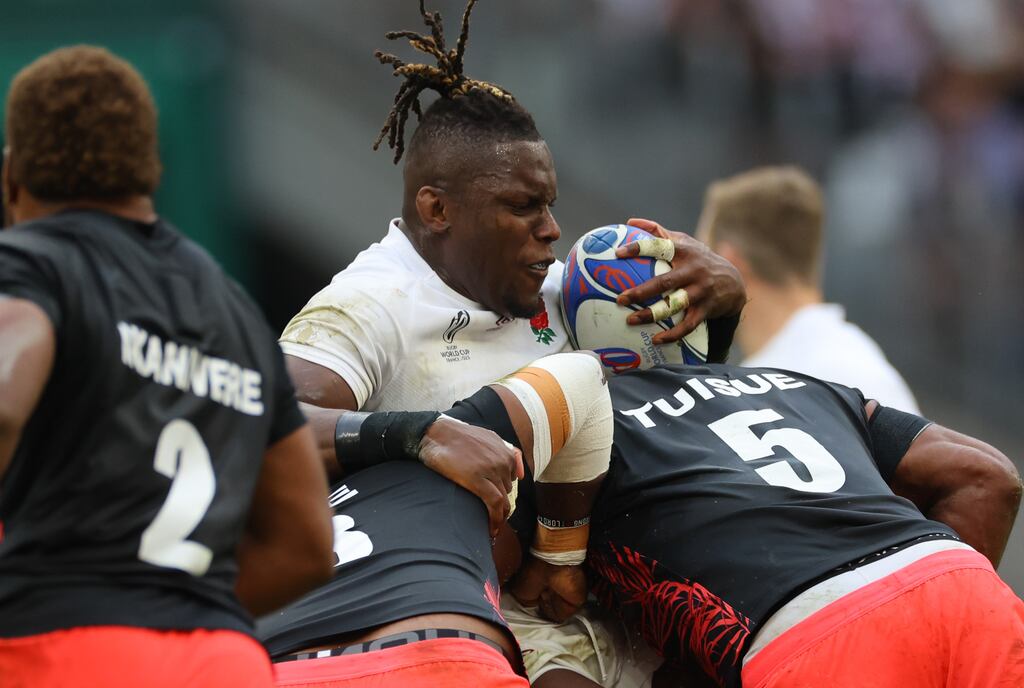 Rugby World Cup: England's Maro Itoje is tackled by Fiji's Albert Tuisue. Photograph: James Crombie/Inpho
