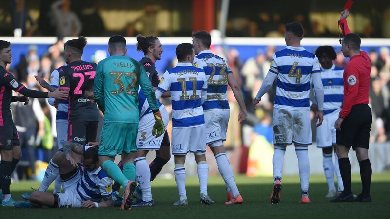 Kalvin Phillips is sent off during Leeds’ defeat to QPR. Photograph: Daniel Hambury/PA