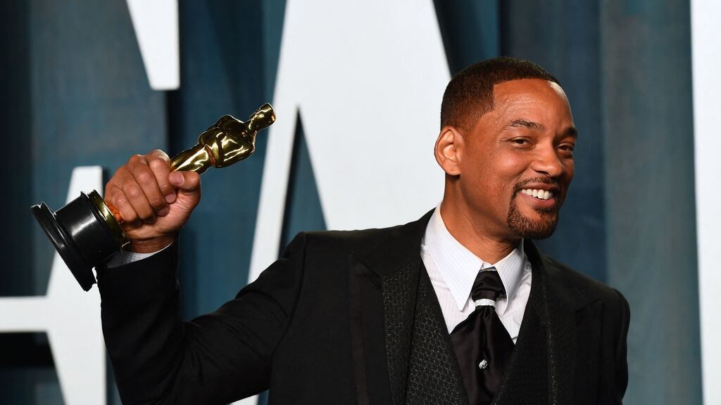 Actor Will Smith with his award for Best Actor in a Leading Role for King Richard. Photograph: Patrick T Fallon/AFP via Getty Images
