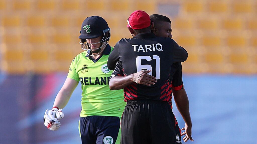 Canada bowler Ramesh Eranga celebrates with wicketkeeper Hamza Tariq after taking the wicket of Ireland’s Kevin O’Brien during the T20 World Cup Qualifier at the Sheikh Zayed stadium in Abu Dhabi. Photograph: ICC