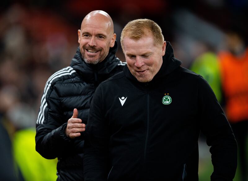 Manchester United manager Erik ten Hag shares a laugh with Omonia Nicosia counterpart Neil Lennon during the Europa League match at Old Trafford. Photograph: Peter Powell/EPA