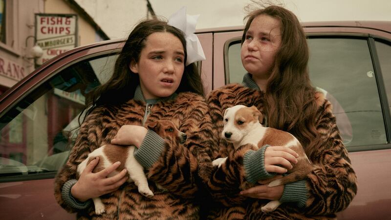 Tilly faux fur tiger coat, €150, with Lillian tiger print knit trousers, €90. Photograph: Ronan Gallagher