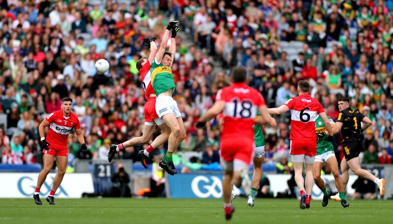 Derry’s Brendan Rogers and Jack Barry of Kerry during the All-Ireland semi-final. File photograph: James Crombie/Inpho