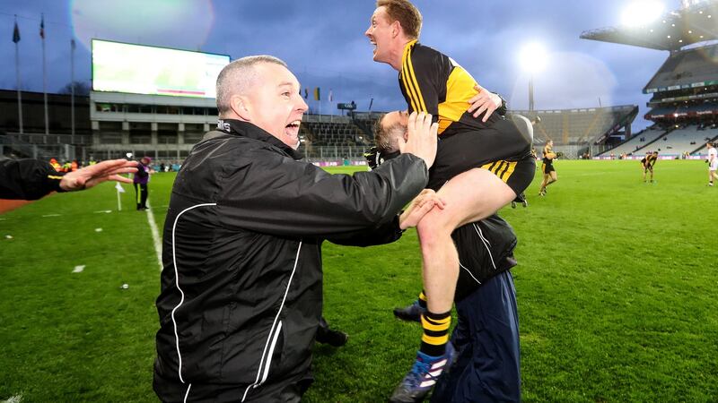 Cooper celebrates with manager Dr Crokes Pat O’Shea after winning the All-Ireland Senior Club Football Championship. Photo: Tommy Dickson/Inpho