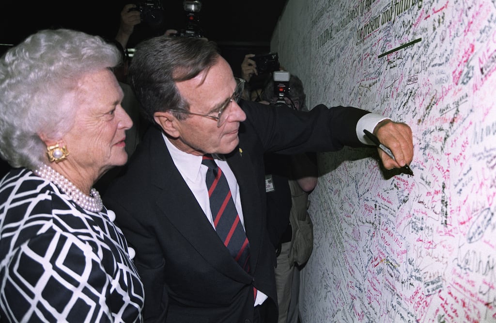 US president George Bush signs an Earth pledge with his wife Barbara during the UN-sponsored Earth summit in Rio de Janeiro in 1992. Photograph: J David Ake/AFP via Getty Images