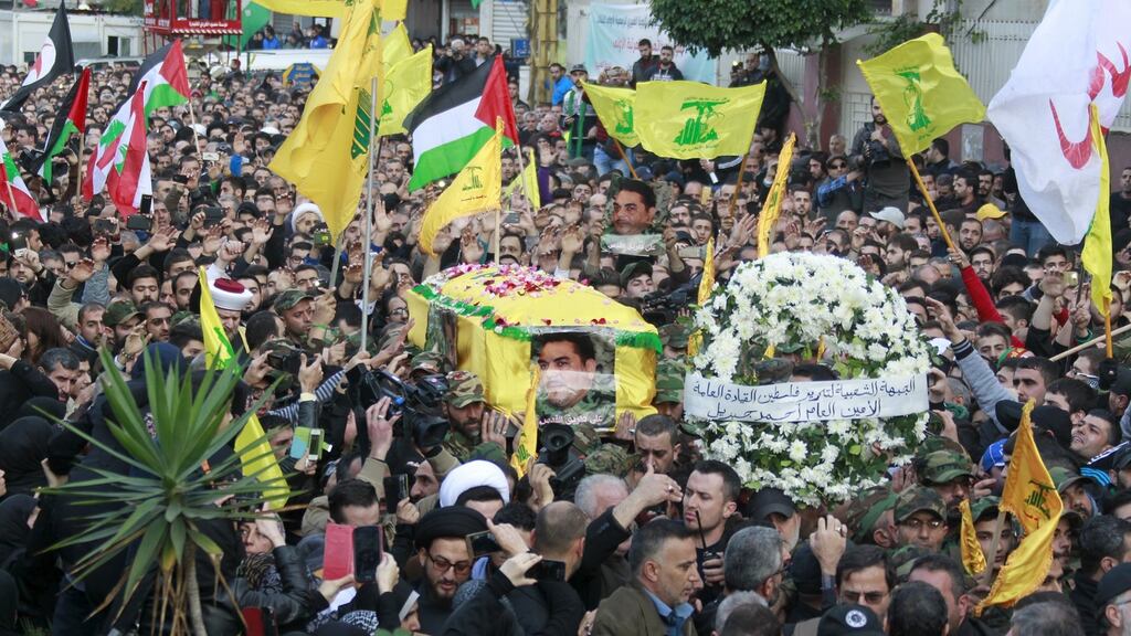 Hizbullah members carry the coffin of  militant leader Samir Qantar during his funeral in Beirut’s southern suburbs. Photograph: Aziz Taher/Reuters