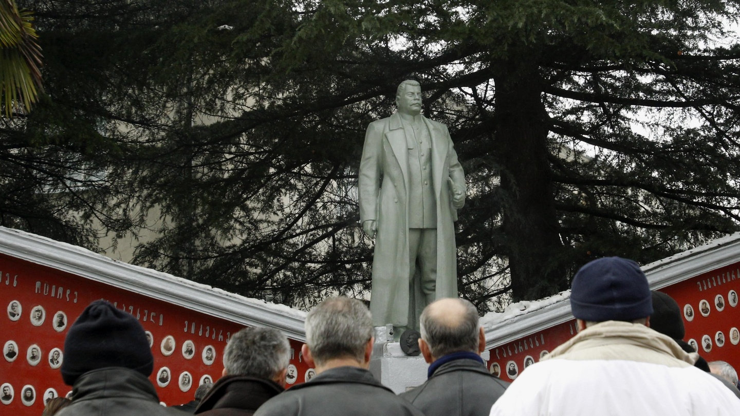 Villagers attend an unveiling ceremony of a newly reinstated monument of Soviet dictator Josef Stalin on his birthday anniversary in the village of Zemo Alvani, northeast of Tbilisi, in December, 2012. Photograph: David Mdzinarishvili / Reuters
