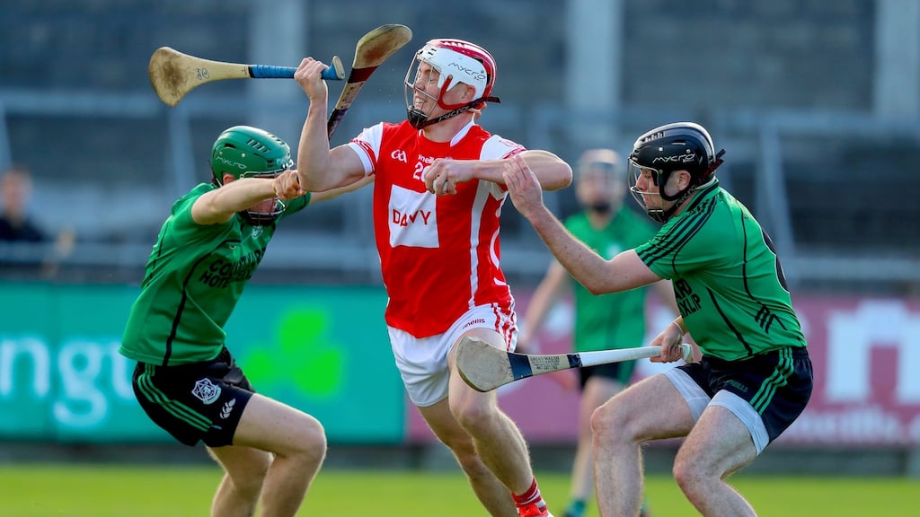 Cuala’s Con O’Callaghan is challenged by Paul Rigney and Ronan Smith of Lucan Sarsfields. Photograph: Oisin Keniry/Inpho