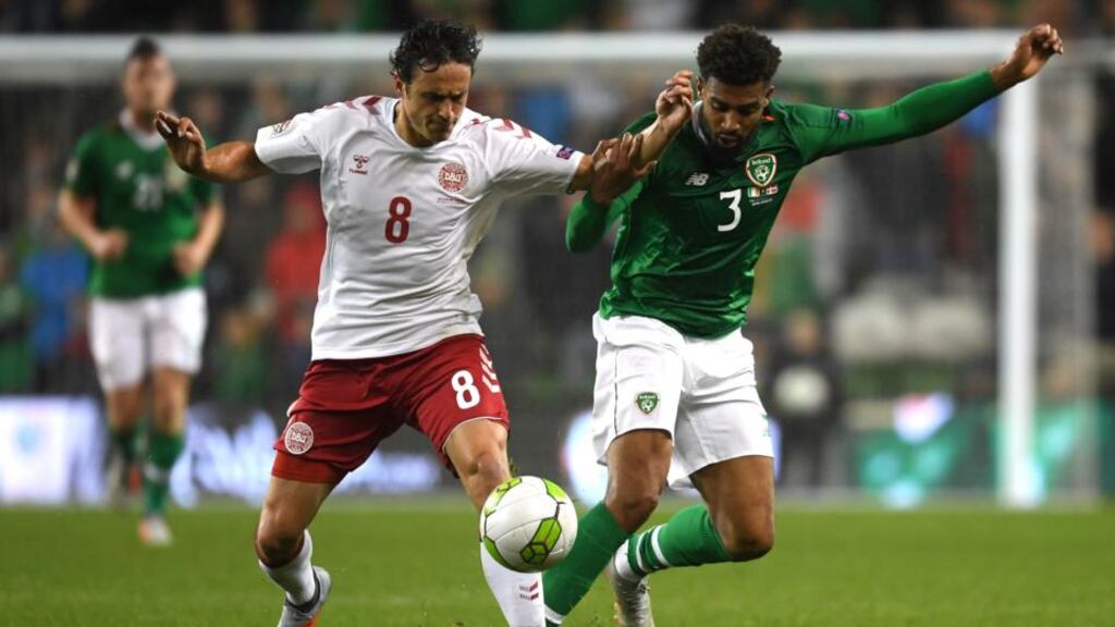 Cyrus Christie challenges Thomas Delaney during Ireland's goalless draw with Denmark. Photograph: Mike Hewitt/Getty