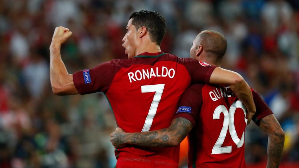 Cristiano Ronaldo celebrates with Ricardo Quaresma’ after his winning penalty against Poland in Marseille. Photograph: Reuters