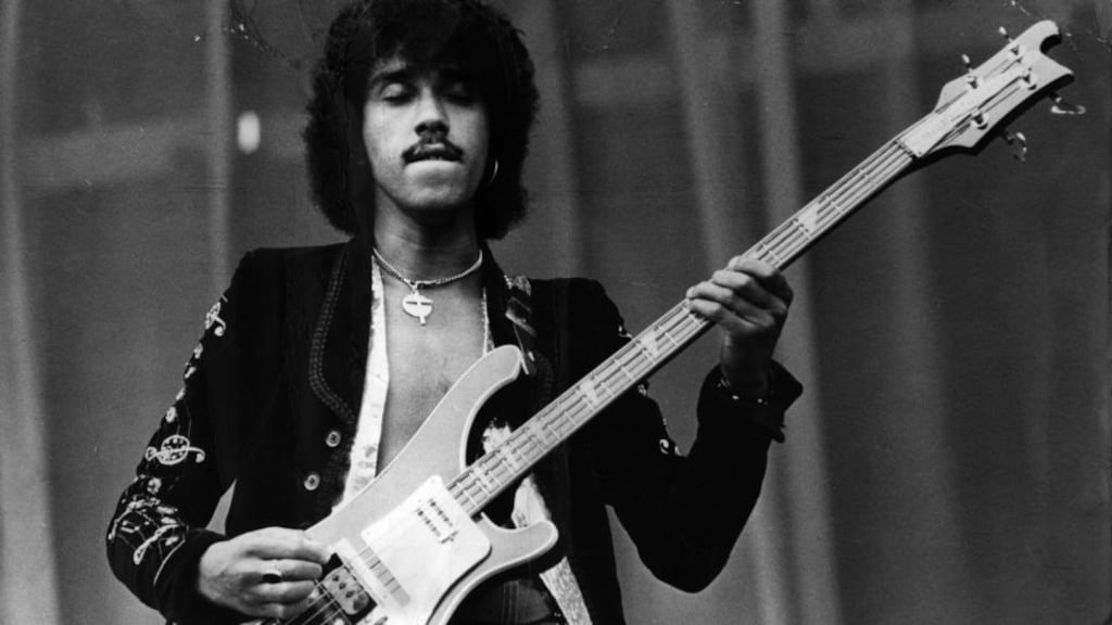 Phil Lynott (1951 - 1986), singer and bass guitarist with the rock group Thin Lizzy, performs on stage on July 12th, 1976. Photograph: Evening Standard/Getty