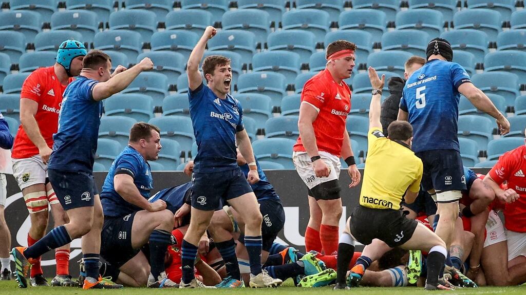 Luke McGrath celebrates after Jack Conan’s try against Munster. Photograph: James Crombie/Inpho