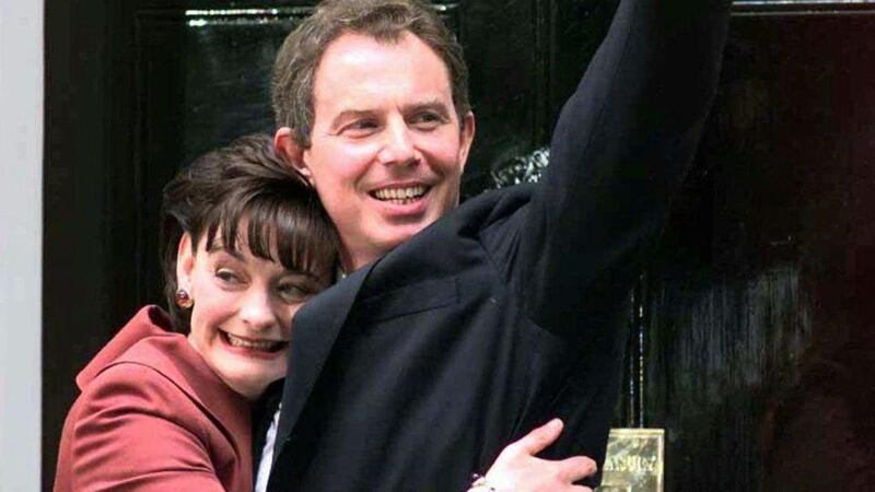 Tony Blair waves outside 10 Downing Street, London, as he is embraced by his wife, Cherie, after his election as prime minister in 1997. Photograph:Max Nash/AP Photo/FILE/