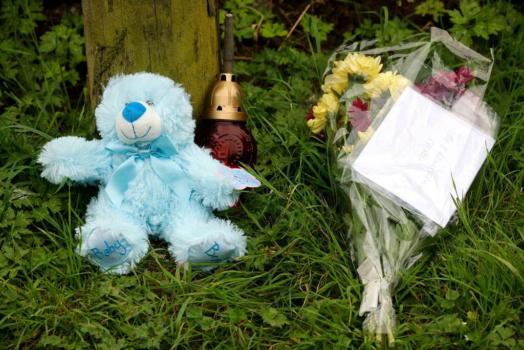 Flowers and a teddy bear left near the scene of the crash where Thomas O' Reilly (45), his wife Bridget O' Reilly (46), and their grandson Tom O'Reilly (3) died. Photograph: Arthur Carron/Collins