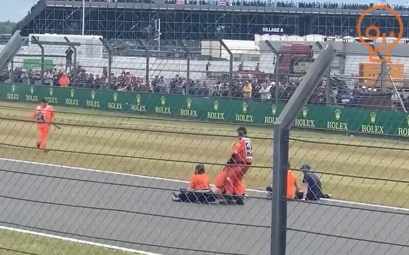 Just Stop Oil climate change protesters during a track invasion at the British Grand Prix. Video still: Northants Police