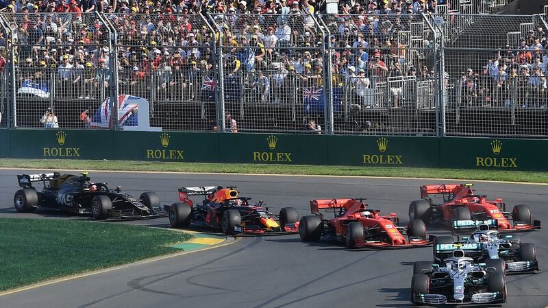 Bottas leads the field out of turn one. Photo: Julian Smith/Reuters