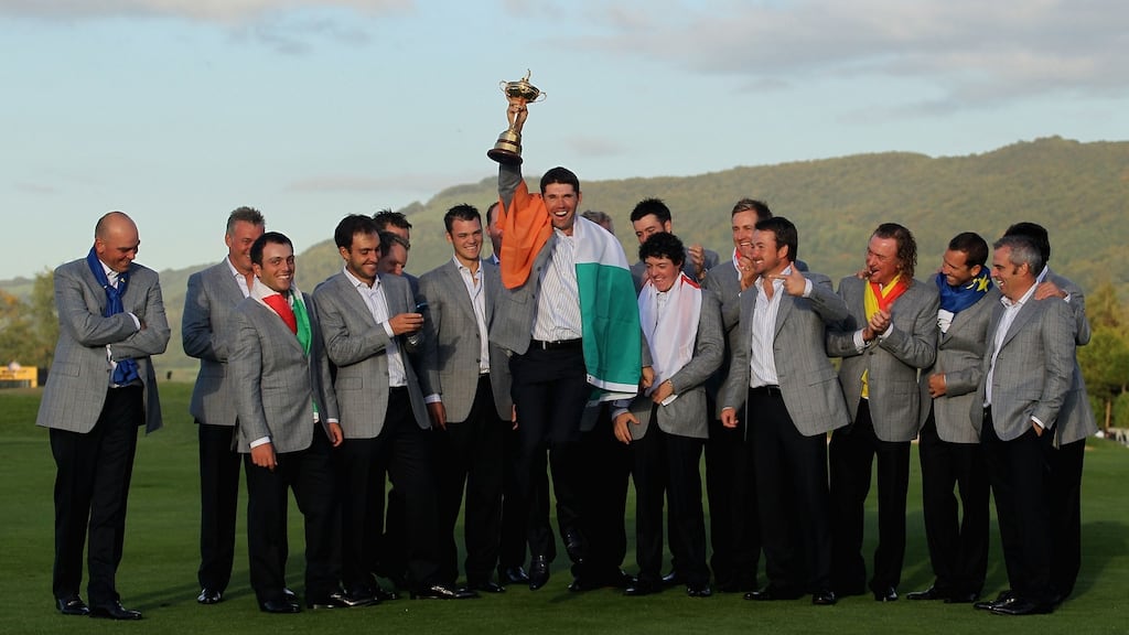 Ireland’s Pádraig Harrington jumps in the air with the Ryder Cup trophy after Europe’s win in the 2019 Ryder Cup at Celtic Manor. Photograph: Andy Lyons/Getty Images