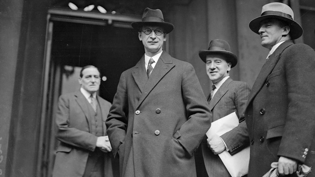 Éamon de Valera with members of his cabinet in December 1937 during the inauguration of the new Constitution, which further defined women’s place as in the home. Photograph: Hulton Archive