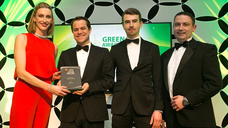 Mark Bennett, CEO, Ambie, presents The Green Retailer award to Deirdre Ryan, Hugh McAfee & Paul Moloney, Lidl Ireland.