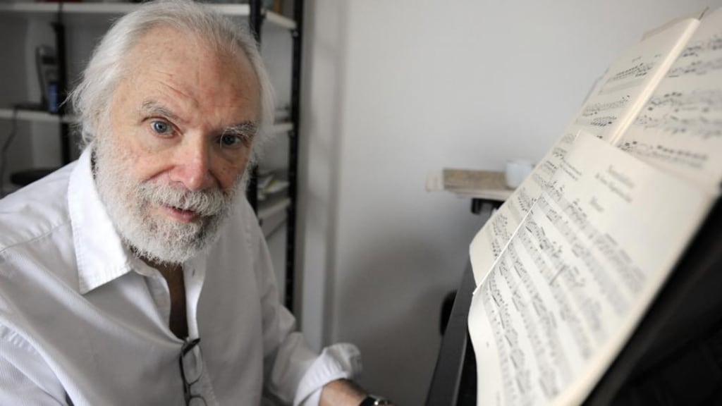 Franco-Greek singer and songwriter Georges Moustaki plays the piano at his home in Paris in 2008. Photograph: Stephane de Sakutin/AFP/Getty