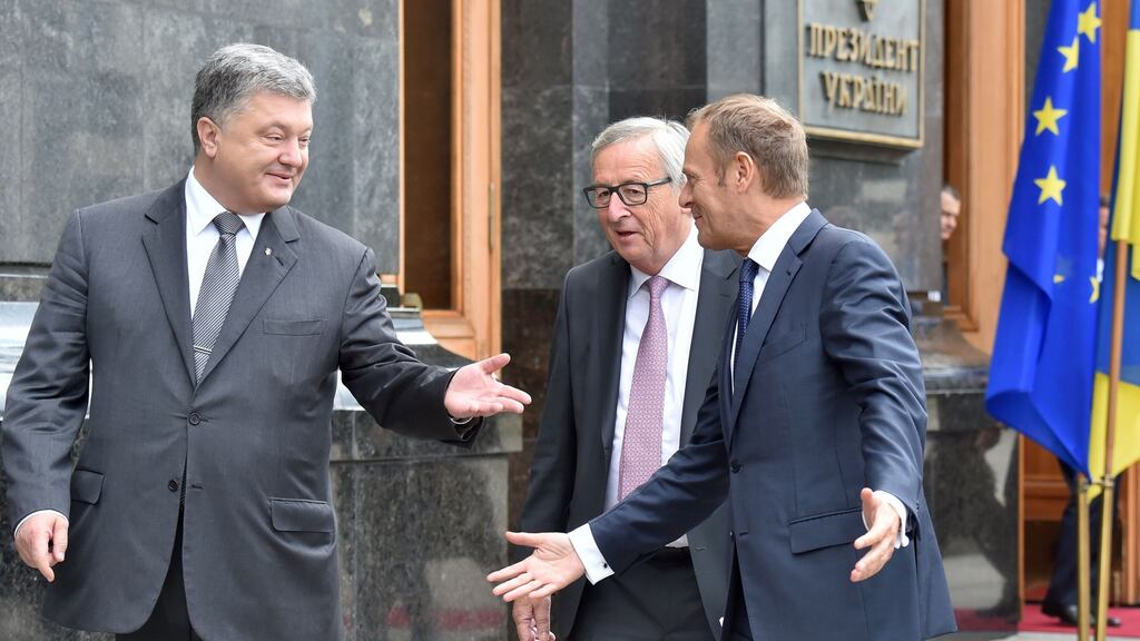 Ukrainian president Petro Poroshenko, president of the European Commission Jean-Claude Juncker and president of the European Council Donald Tusk: met at Ukraine-EU summit in Kiev. Photograph: Sergei Supinsky/AFP/Getty