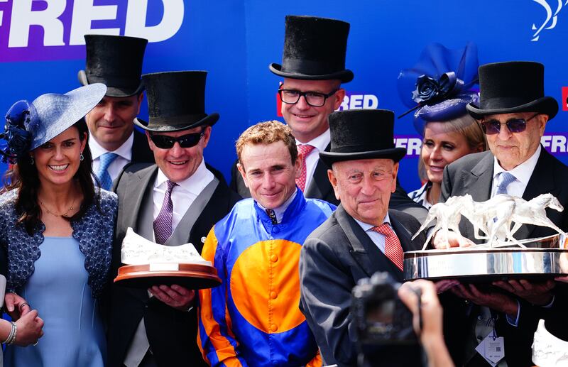 Trainer Aidan and jockey Ryan Moore join connections to celebrate winning the Betfred Derby with Auguste Rodin at Epsom. Photograph: Victoria Jones/PA Wire.