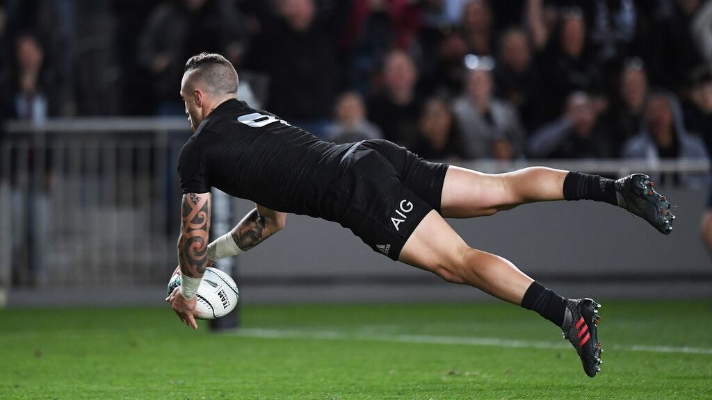 TJ Perenara of New Zealand scores a try against Australia. Photo: Inpho