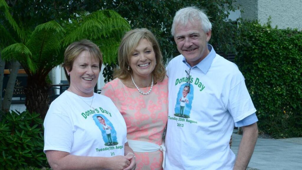Mary Kennedy (centre) chairman of the judges of the Rose of Tralee   with Elma and Fionbarr Walsh, the parents of the late Donal Walsh.