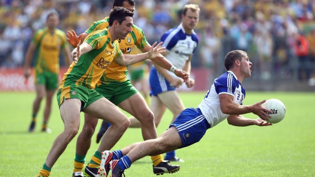 Donegal’s Rory Kavanagh with Monaghan’s Padraig Donaghy. Photograph: Inpho/Presseye/William Cherry