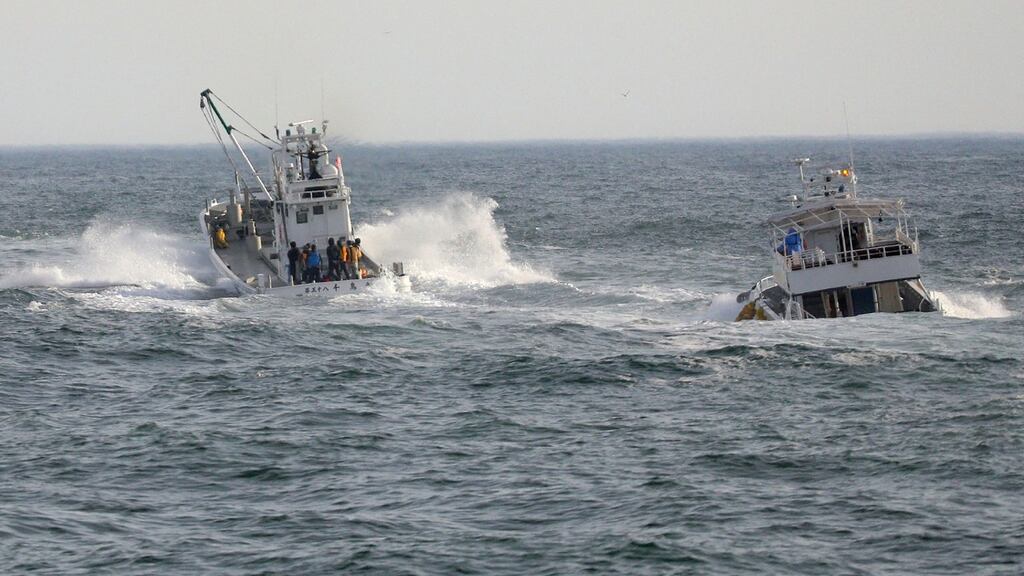 Fishing boats conduct a search operation for missing people aboard the Kazu 1 sightseeing boat, that went missing in the Sea of Okhotsk near Shari, Okhotsk Subprefecture of Hokkaido. Photograph: Jiji Press/AFP via Getty Images