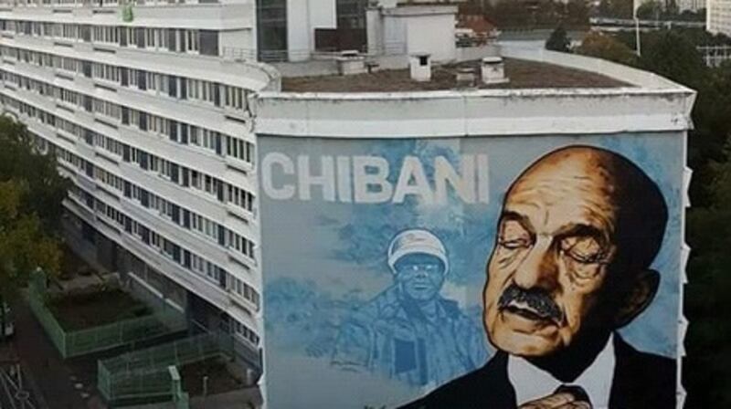 Wall portrait of Mohand Dendoune, who died earlier this year at the age of 90. His son Nadir, a writer, film-maker and journalist, says the portrait, by the street artist Vince, is a form of immortality