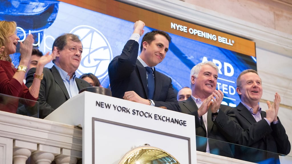 Paul Coulson (second from left), chairman of Ardagh Group, rings the opening bell of the New York Stock Exchange in 2017 alongside John Tuttle, global head of listings at the NYSE, Ian Curley, CEO of Ardagh Group, and John Sheehan, director of investor relations of Ardagh Group