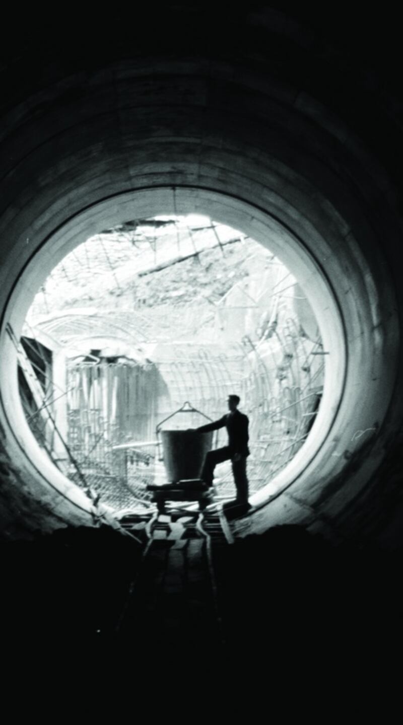 A dam being constructed at Poulaphouca in 1940. Browne’s image of a man standing within the pipe provides a sense of the scale of the operation