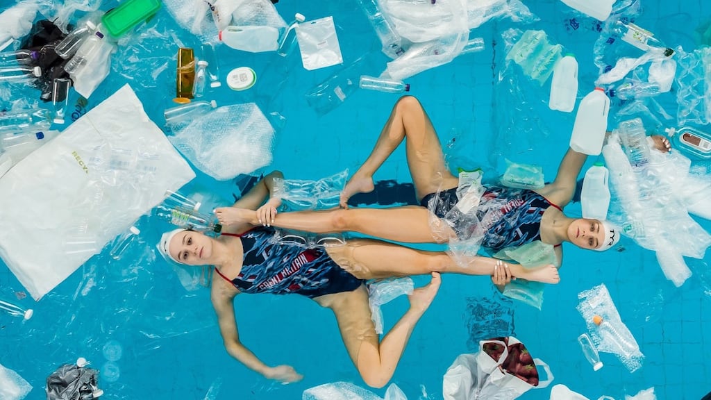 British synchronised swimming duet Kate Shortman and Isabelle Thorpe attempt their routine in a pool filled with plastic. Photograph: Nigel Davies / PA