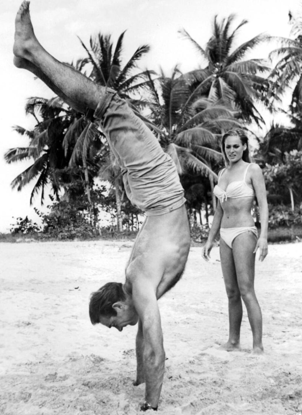 Sean Connery and Ursula Andress on the set of Dr No (1962), the first James Bond film. Photograph: United Artist/Getty
