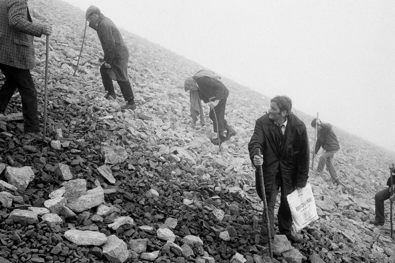 Pilgrims climb Croagh Patrick, in Co Mayo. From A Fair Day. 1983. © Martin Parr/Magnum Photos