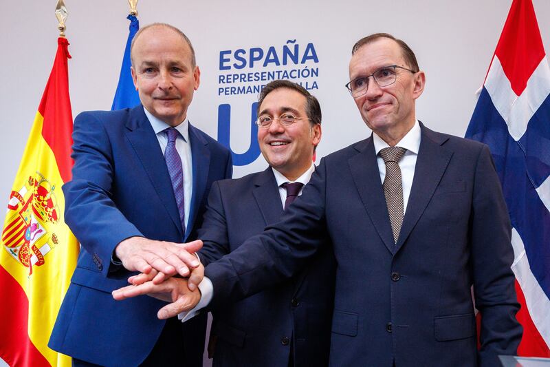 (L-R) Michael Martin with Spain's foreign minister Jose Manuel Albares and Norway's foreign minister Espen Barth Eide join hands on the recognition of Palestinian statehood in Brussels in 2024. Photograph: Olivier Matthys/European Pressphoto Agency