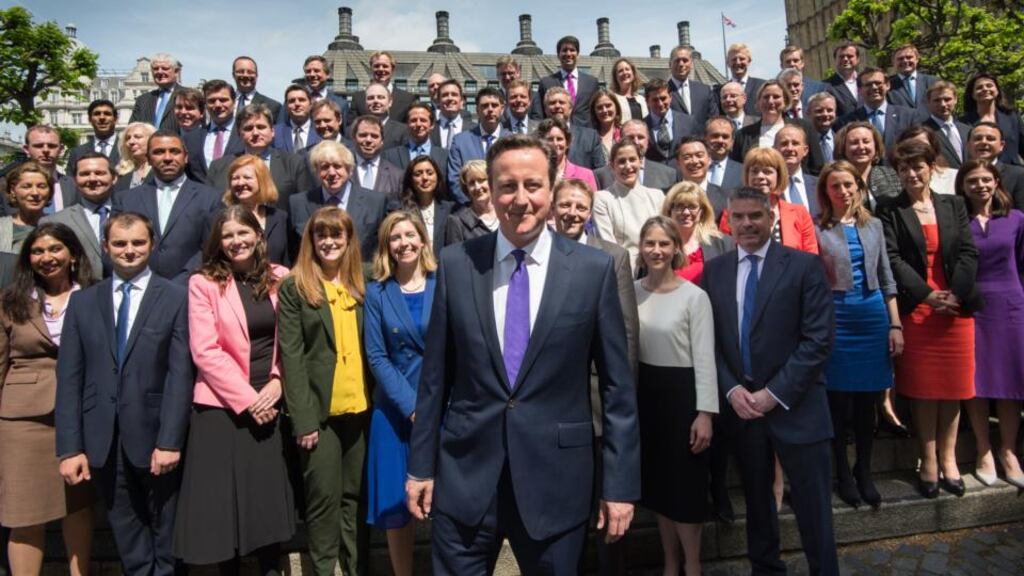 Prime minister David Cameron poses for a photograph with newly-elected Conservative MPs in London.  Photograph: Stefan Rousseau - WPA Pool/Getty Images