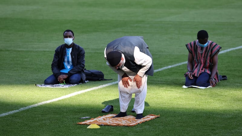 Man in Eid prayer at Croke Park, Dublin. Photograph: Dara Mac Dónaill