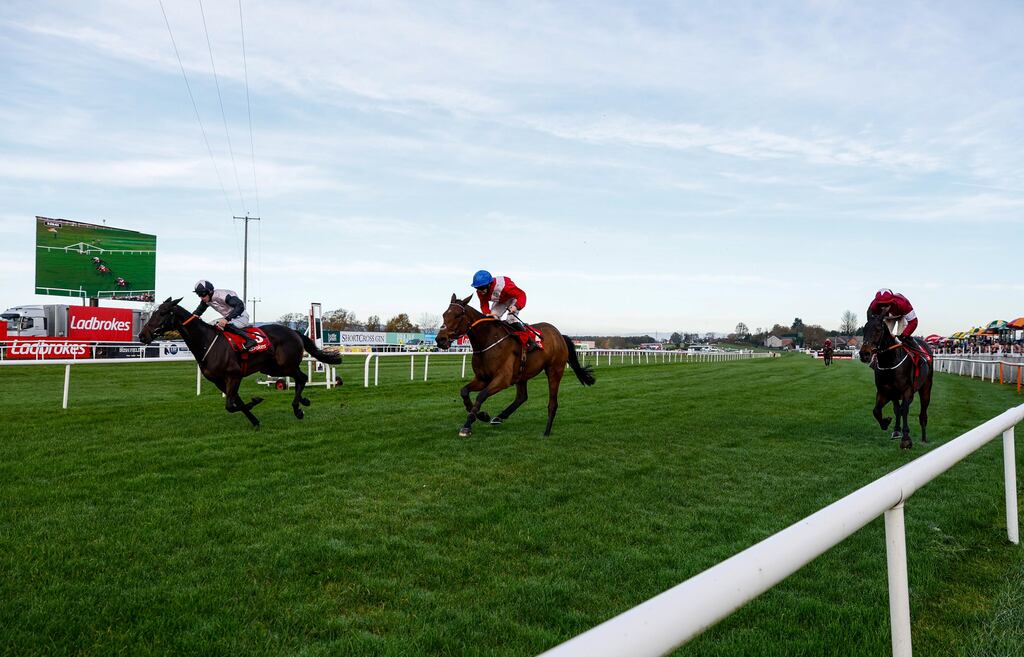 Gerri Colombe (left) gets home to win the Ladbrokes Champion Chase at Down Royal on Saturday. Photograph: Phil McGowan/Inpho