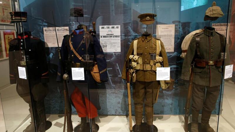 First World War uniforms (from left) from Belgium, France, Britain and Germany in the exhibition “Join Now! The British Empire’s Entry into The War” at the Museum of the Great War in Meaux. Photograph: Reuters/Benoit Tessier