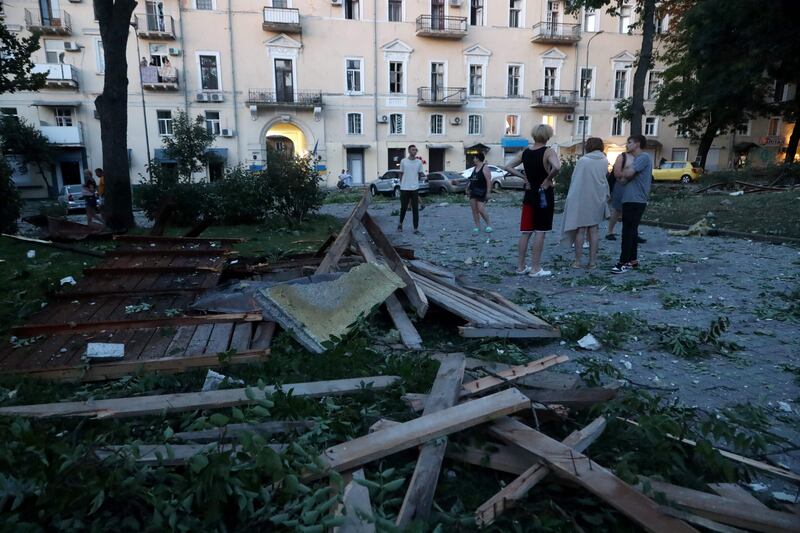 People stand outside a residential building after a missile strike in Odesa early on July 23rd, 2023. Photograph: OLEKSANDR GIMANOV/AFP via Getty Images