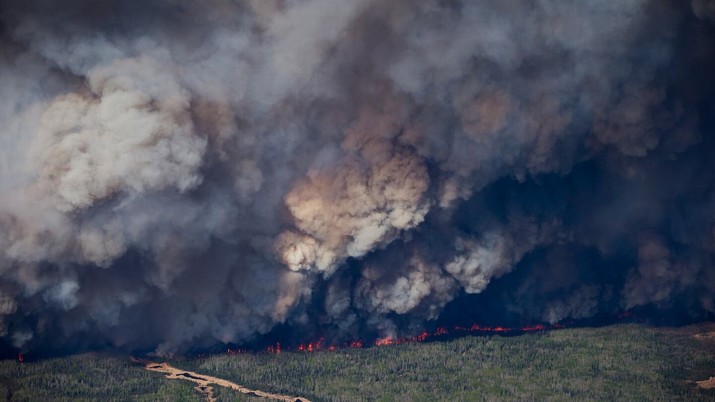 Smoke rises from wildfires burning in this aerial photograph taken above Fort McMurray, Alberta, Canada, on Friday. Photograph: Bloomberg