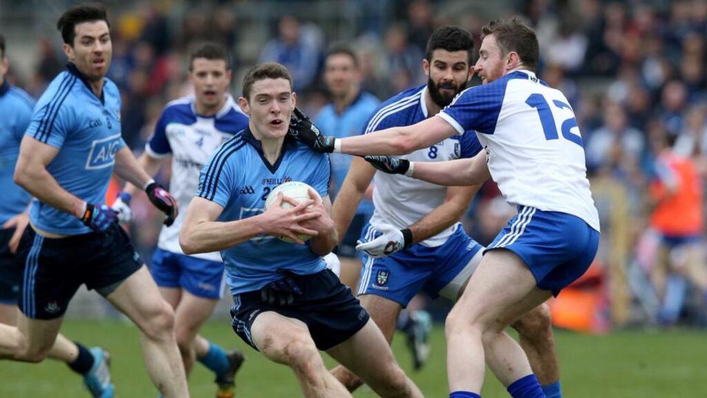 Brian Fenton, seen here in possession against Monaghan  in the league, starts at centrefield for Dublin. Photograph: Ryan Byrne/Inpho. Allianz Football League Division 1, Clones, Monaghan 5/4/2015Monaghan vs DublinMonghan’s Owen Duffy and Brian Fenton of Dublin Mandatory Credit ©INPHO/Ryan Byrne.