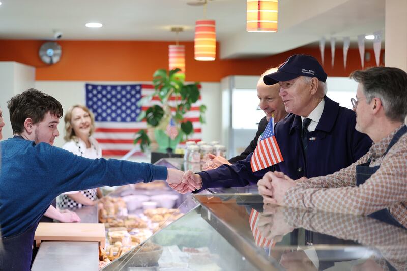 Joe Biden visits a deli counter in Dundalk as part of his trip. Photograph: Julien Behal/PA
