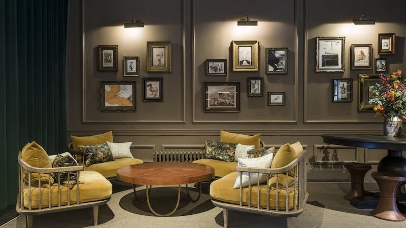 A gallery wall such as this at the Principal Edinburgh can allow you to play with the textures and shapes of the frames to create a shape so you create an artwork within an artwork.