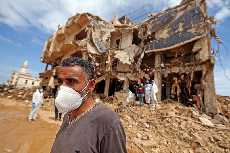 Rescue teams assist in relief work in Libya's eastern city of Derna. Photograph: Karim Sahib/AFP via Getty Images