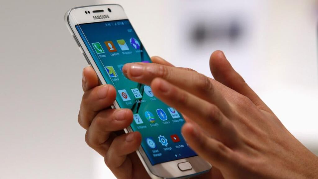 The new Samsung Galaxy S6 Edge: You can pick it up relatively cheaply on contract but, sim free, it will set you back around €900 for the 64GB version. Photograph: Gustau Nacarino/Reuters