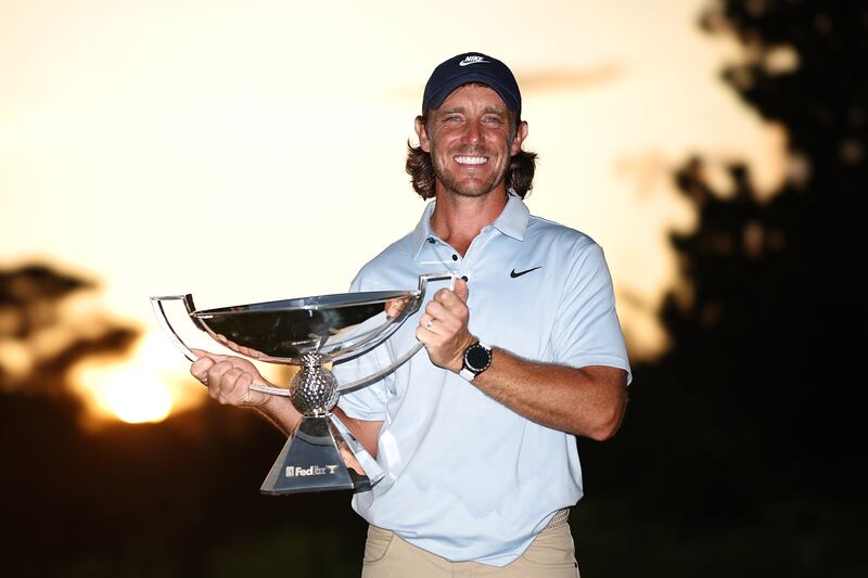Tommy Fleetwood of England poses with the FedEx Cup trophy after winning the final round of the Tour Championship 2025 at East Lake. Photograph: Jared C Tilton/Getty